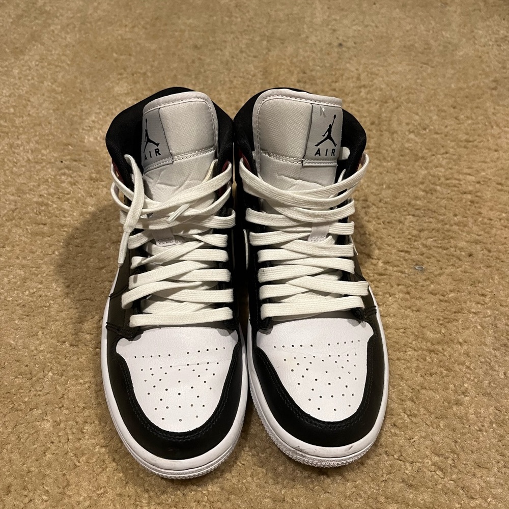 Black noble mid jordan 1s